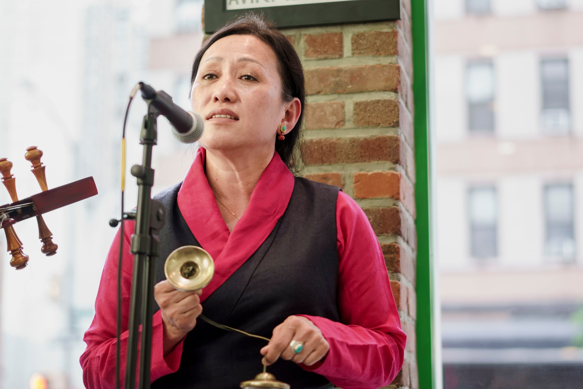 Singer with hand cymbals
